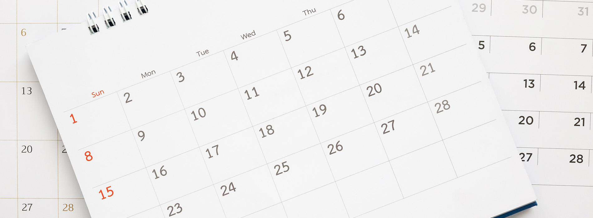 The image shows a calendar with dates and days of the week printed on it, displayed in a grid format.