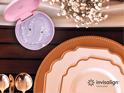 The image displays a collection of tableware items, including plates, bowls, and a box of dental implants, against a blurred background with a focus on the products.